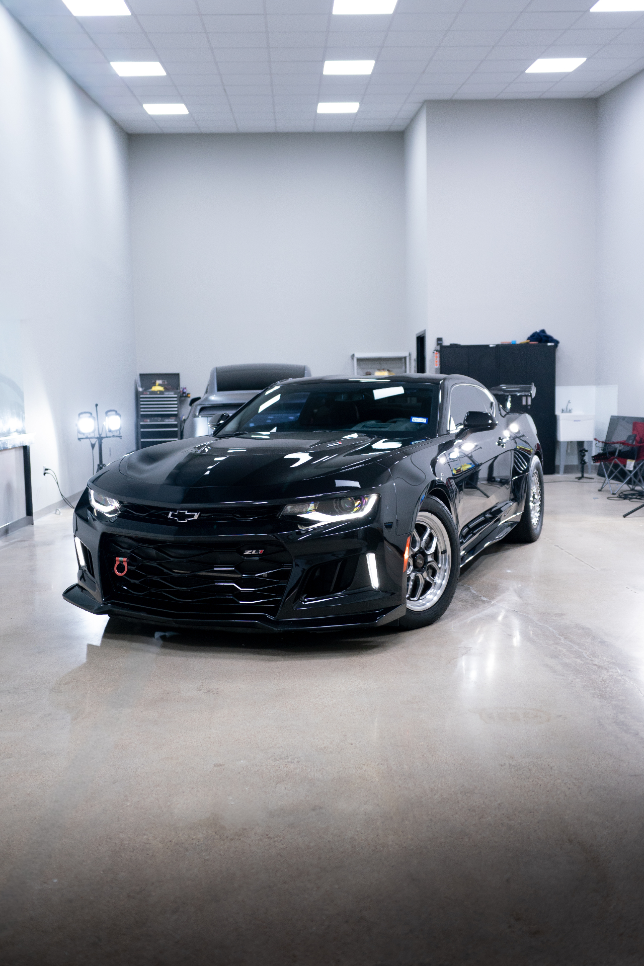 Blacked-out Chevrolet Camaro ZL1 in the detail studio