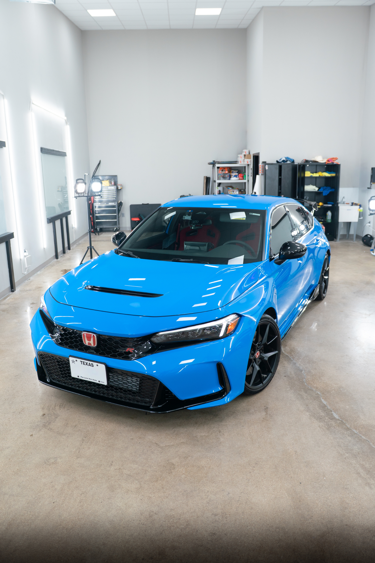 Ceramic coated blue Honda Civic Type R in the NTX Auto Care shop