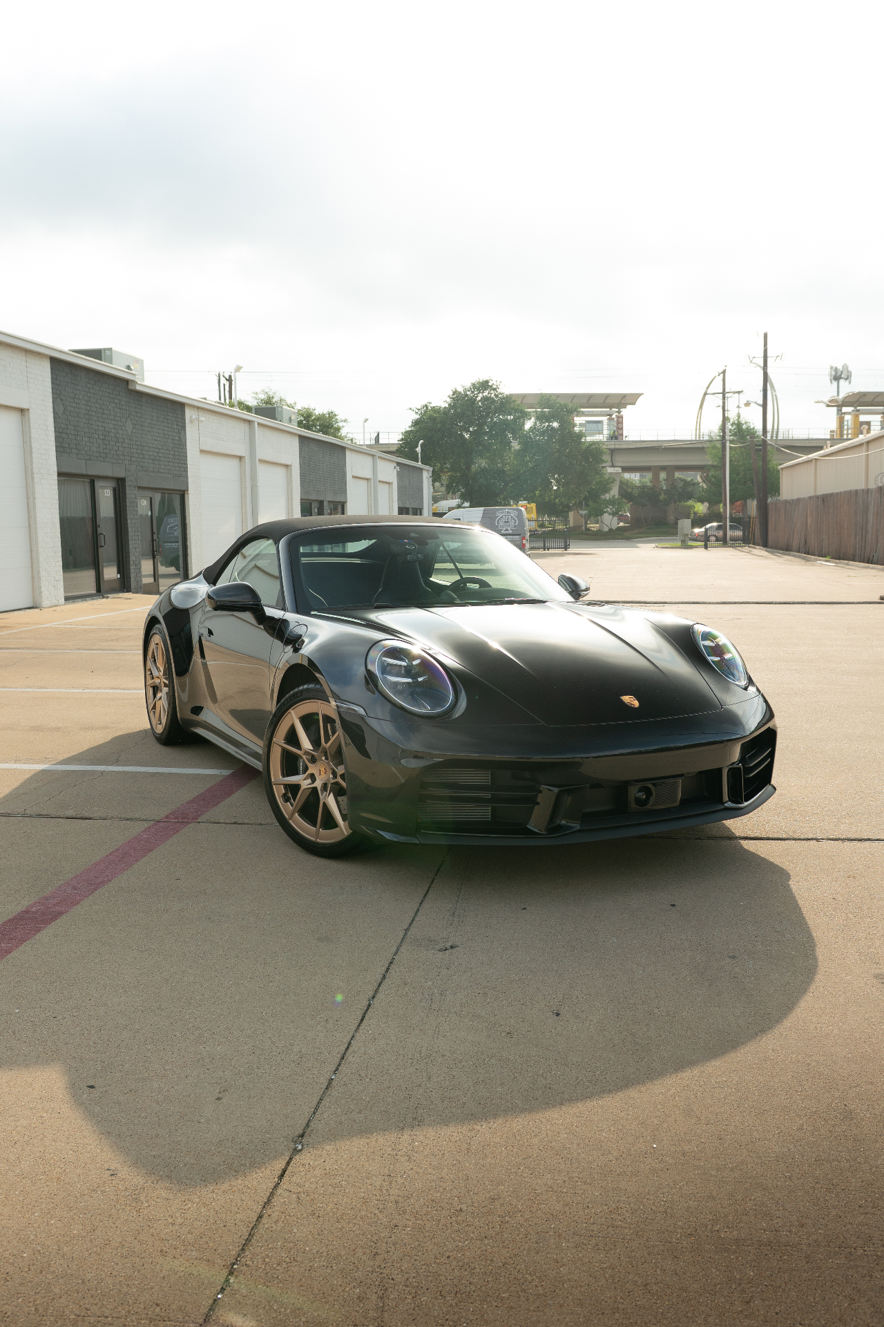 Glossy black Porsche 911 after ceramic coating